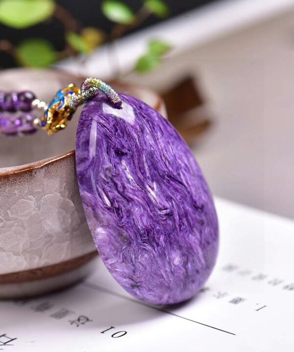 Natural Russian Purple Dragon Crystal Droplet Pendant, with a size of 45 * 30 * 10.8mm and a total weight of 27.9g2710169146