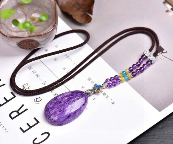 Natural Russian Purple Dragon Crystal Droplet Pendant, with a size of 45 * 30 * 10.8mm and a total weight of 27.9g2710169146