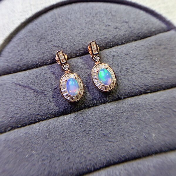Pure natural dazzling white opal earrings, with a main stone size of 4 * 6mm0211110156