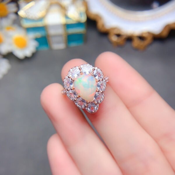 Pure natural dazzling white opal ring, with a main stone size of 8 * 10mm1115190633